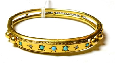 Lot 115 - A 9ct gold stiff hinge bangle, turquoise and diamond set, stamped '375'