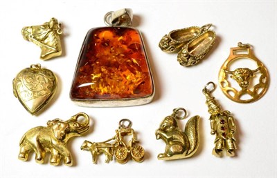 Lot 122 - A collection of various 9ct gold and yellow metal charms etc (9)