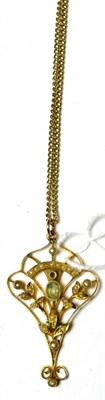 Lot 129 - An Art Nouveau pendant, set with seed pearls, on chain