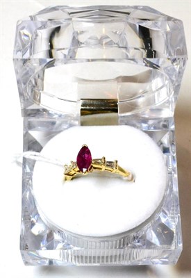 Lot 136 - A ruby and diamond ring, stamped '18K'