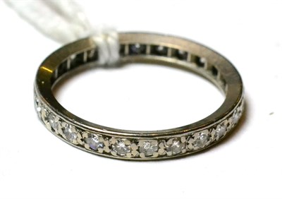 Lot 152 - A diamond full eternity ring (a.f.)