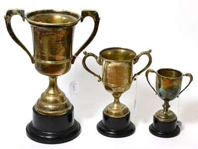 Lot 171 - A group of three silver trophy cups, awarded to 1st, 2nd and 3rd places for Flour Mills Bread...