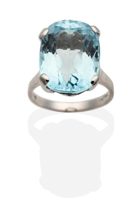 Lot 315 - An 18 Carat White Gold Aquamarine Ring, an oval cut aquamarine in a claw setting, to straight...