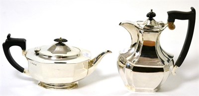 Lot 183 - A silver teapot and a silver hot water pot