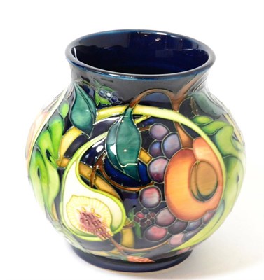 Lot 197 - A modern Moorcroft Queens Choice vase, designed by Emma Bossons, 14.5cm (boxed)