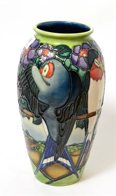 Lot 198 - A modern Moorcroft Swallows pattern vase, designed by Rachel Bishop, numbered 228/500, 25.5cm...