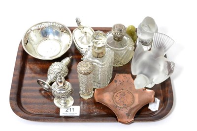 Lot 211 - A silver pierced dish, silver mustard, silver pepperettes, silver topped dressing table jars,...