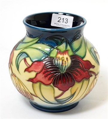 Lot 213 - A Moorcroft pottery lily pattern vase, inscription to base 'Adam; with thanks...from your...