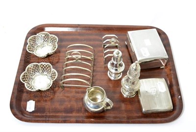 Lot 215 - A group of silver including a pair of pierced Mappin & Webb dishes, a six division toast rack,...