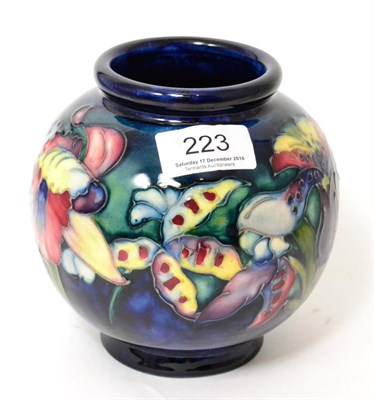 Lot 223 - A William/Walter Moorcroft Orchid and Spring flowers pattern vase, impressed factory marks and...