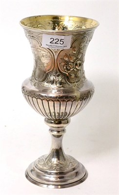 Lot 225 - An early Victorian silver goblet form trophy decorated with floral repousse