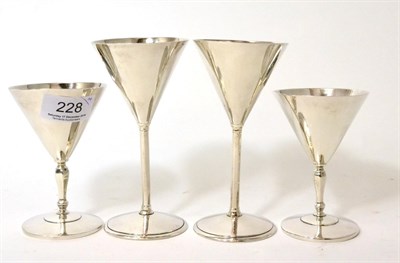 Lot 228 - Four Art Deco silver conical goblets, circa 1930s