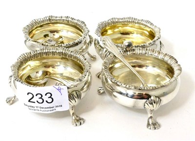 Lot 233 - A set of four silver cauldron salts, London 1892; with four mixed spoons