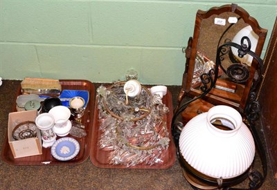 Lot 257 - Three silver backed dressing table mirrors and a silver backed hand mirror, three lustre drop light