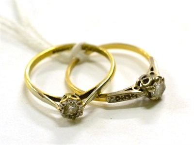 Lot 265 - Two 18ct gold and platinum diamond solitaire rings