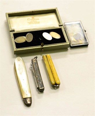 Lot 266 - A pair of 9ct gold cufflinks with a silver pair, pen knife and two others