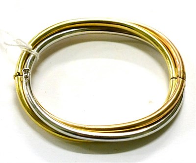 Lot 270 - A three colour gold bangle