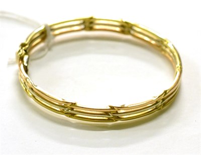 Lot 276 - A bangle stamped '375'