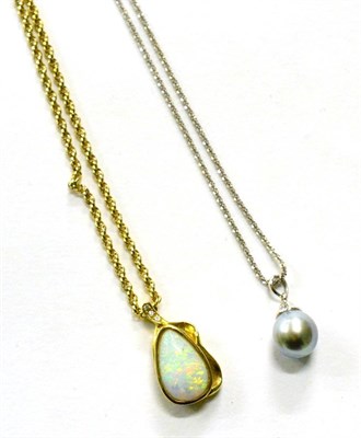 Lot 280 - An opal set pendant on a 9ct gold chain and another with a pearl pendant