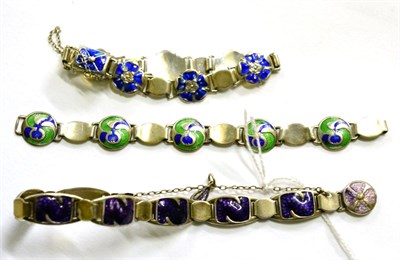 Lot 300 - A silver and enamel bracelet by James Fenton, a silver and enamel bracelet by Stainton Bros...