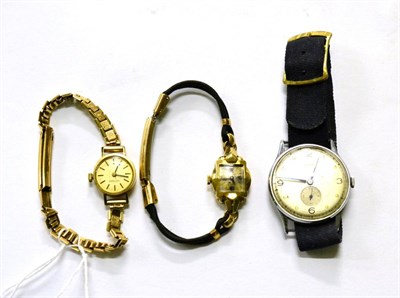 Lot 303 - A 9ct gold lady's Tissot watch and two other watches