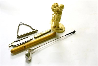 Lot 316 - Ivory figure of a young girl carrying a basket, circa 1900, two pen knives, whistle, a white...