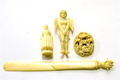 Lot 318 - A collection of ivory, circa 1900, comprising a Cantonese plaque, a figural wafer/stamp/needle...