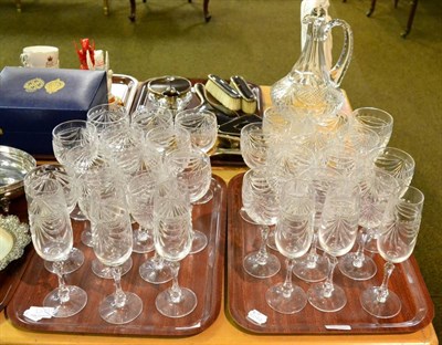 Lot 325 - A cut glass suite of six champagne flutes, twelve red wine goblets, twelve white wine goblets and a