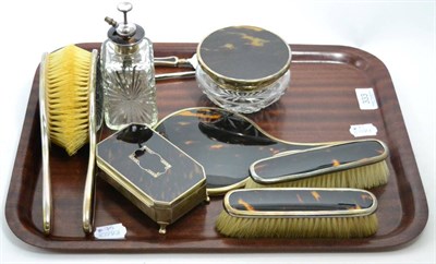 Lot 333 - A George V dressing table set mounted in tortoiseshell and silver, comprising trinket box,...