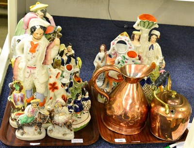 Lot 346 - Eleven Victorian Staffordshire pottery flatback figures or groups, a half gallon copper measure and