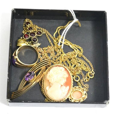 Lot 357 - An amethyst brooch, three chains, an 18ct gold chain and pendant and a ring