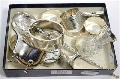 Lot 373 - Various silver items to include six napkin rings, pocket watch, vesta, embossed spoon, bangle,...