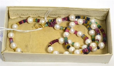 Lot 382 - A cultured pearl and multi-coloured sapphire bead necklace, round cultured pearls spaced by...