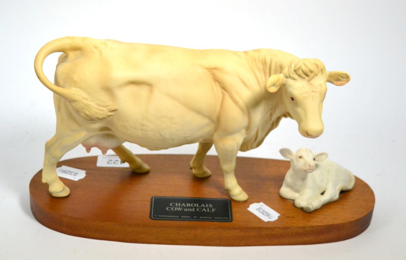 Lot 422 - A Beswick Charolais cow and calf model from the Connoisseur collection, on plinth base