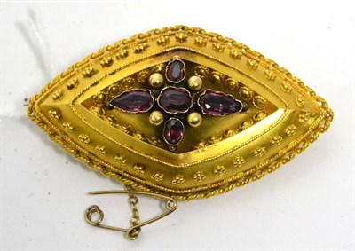 Lot 432 - A Victorian garnet brooch, the lozenge form of matt finish and decorated with rope twists and...