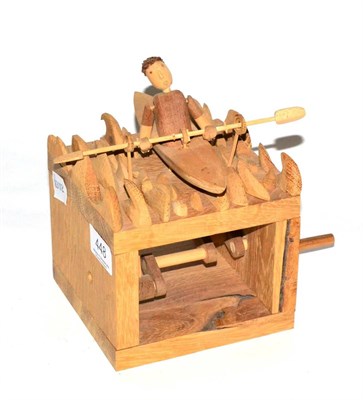 Lot 448 - Wanda Sowrey, a wooden automaton, canoeist, figure in boat on cube form base, 18cm in height