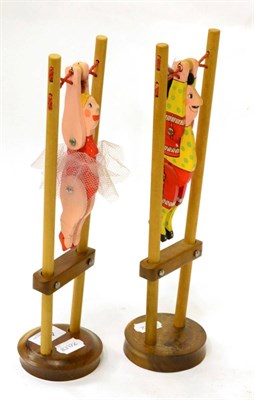 Lot 451 - Gurr and Jameson, Low Tech Toys, two trapeze artists, traditional form, both 35cm in height (2)