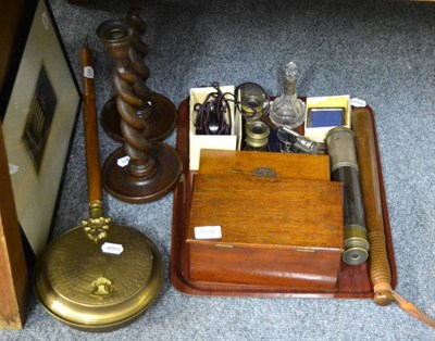 Lot 1032 - A tray including a pair of oak candlesticks, cap pistol, telescope, truncheon, silver mounted scent