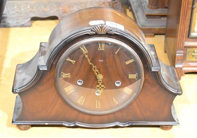 Lot 1043 - A walnut mantel clock