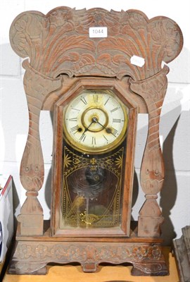 Lot 1044 - An American gingerbread clock