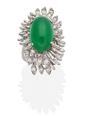 Lot 356 - An 18 Carat White Gold Emerald and Diamond Cluster Ring, an oval cabochon emerald in a claw setting