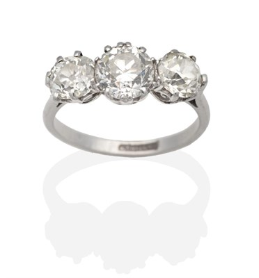 Lot 358 - A Diamond Three Stone Ring, graduated old cut diamonds in claw settings, to tapering shoulders,...