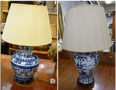 Lot 1099 - Two reproduction Chinese blue and white vase lamps and shades