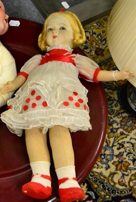 Lot 1122 - Lenci type fabric doll, with blond plaits, painted face, fabric body, wearing a white dress...