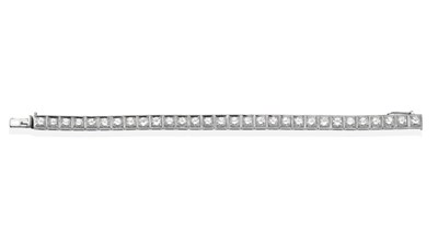 Lot 363 - An 18 Carat White Gold Diamond Line Bracelet, round brilliant cut diamonds in square links,...