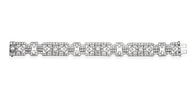 Lot 364 - An Art Deco Diamond Bracelet, pierced rectangular links with a central marquise cut diamond to...