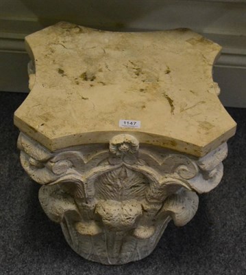 Lot 1147 - A marble Corinthian column cap form coffee table with square glass top