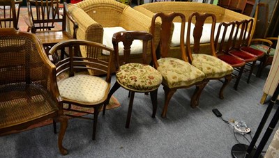 Lot 1149 - An early 20th century bergere chair, an Edwardian inlaid mahogany tub chair, a carved mahogany...