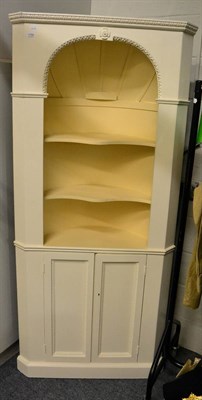 Lot 1159 - A white painted standing corner cupboard