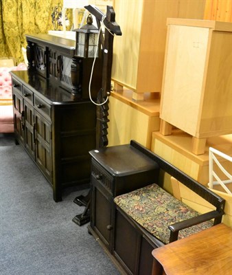 Lot 1189 - A priory furniture court cupboard with leaded glass doors, a telephone seat and matching...